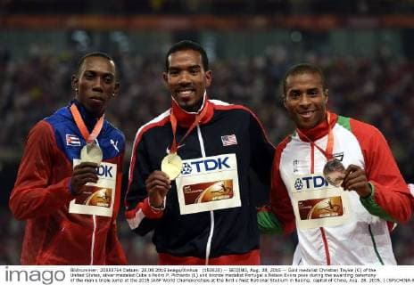 (150828) -- BEIJING, Aug. 28, 2015 -- Gold medalist Christian Taylor (C) of the United States, silver medalist Cuba s Pedro P. Pichardo (L) and bronze medalist Portugal s Nelson Evora pose during the awarding ceremony of the men s triple jump at the 2015 IAAF World Championships at the Bird s Nest National Stadium in Beijing, capital of China, Aug. 28, 2015. ) (SP)CHINA-BEIJING-IAAF WORLD CHAMPIONSHIPS-MEN S TRIPLE JUMP AWARDING CEREMONY (CN) GongxLei 