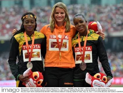 (150829) -- BEIJING, Aug. 29, 2015 -- Gold medalist, the Netherlands Dafne Schippers(C), silver medalist Jamaica s Elaine Thompson (L) and Veronica Campbell-Brown pose during the women s 200m awarding ceremony at the 2015 IAAF World Championships at Bird s Nest National Stadium in Bejing, capital of China, Aug. 29, 2015. ) (SP)CHINA-BEIJING-IAAF WORLD CHAMPIONSHIPS-WOMEN S 200M AWARDING CEREMONY (CN) LixWen 