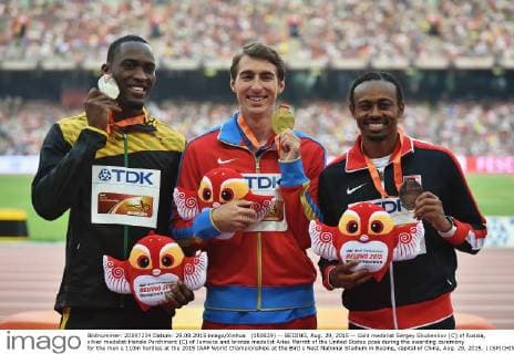 (150829) -- BEIJING, Aug. 29, 2015 -- Gold medalist Sergey Shubenkov (C) of Russia, silver medalist Hansle Parchment (C) of Jamaica and bronze medalist Aries Merritt of the United States pose during the awarding ceremony for the men s 110m hurdles at the 2015 IAAF World Championships at the Bird s Nest National Stadium in Beijing, capital of China, Aug. 29, 2015. ) (SP)CHINA-BEIJING-IAAF WORLD CHAMPIONSHIPS-MEN S 110M HURDLES AWARDING CEREMONY (CN) LixWen 