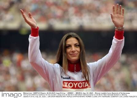 (150829) -- BEIJING, Aug. 29, 2015 -- Bronze medalist Ivana Spanovic of Serbia poses during the awarding ceremony for the women s long jump at the 2015 IAAF World Championships at the Bird s Nest National Stadium in Beijing, capital of China, Aug. 29, 2015. ) (SP)CHINA-BEIJING-IAAF WORLD CHAMPIONSHIPS-WOMEN S LONG JUMP AWARDING CEREMONY (CN) LixWen 