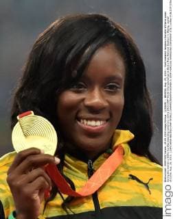 (150829) -- BEIJING, Aug. 29, 2015 -- Gold medalist Jamaica s Danielle Williams poses during the women s 100m hurdles awarding ceremony at the 2015 IAAF World Championships at Bird s Nest National Stadium in Bejing, capital of China, Aug. 29, 2015. ) (SP)CHINA-BEIJING-IAAF WORLD CHAMPIONSHIPS-WOMEN S 100M HURDLES AWARDING CEREMONY (CN) LixWen 