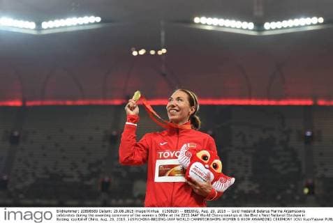 (150829) -- BEIJING, Aug. 29, 2015 -- Gold medalist Belarus Marina Arzamasova celebrates during the awarding ceremony of the women s 800m at the 2015 IAAF World Championships at the Bird s Nest National Stadium in Beijing, capital of China, Aug. 29, 2015. ) (SP)CHINA-BEIJING-IAAF WORLD CHAMPIONSHIPS-WOMEN S 800M AWARDING CEREMONY (CN) YuexYuewei 