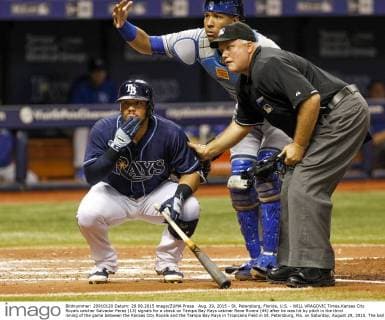 Aug. 29, 2015 - St. Petersburg, Florida, U.S. - WILL VRAGOVIC Times.Kansas City Royals catcher Salvador Perez (13) signals for a check on Tampa Bay Rays catcher Rene Rivera (44) after he was hit by pitch in the third inning of the game between the Kansas City Royals and the Tampa Bay Rays in Tropicana Field in St. Petersburg, Fla. on Saturday, August 29, 2015. The ball glanced off Tampa Bay Rays catcher Rene Rivera s arm before hitting him in the face, and he stayed in the game. Florida News - Aug. 29, 2015 - ZUMAs70_