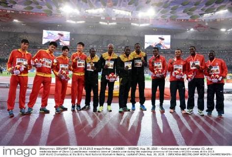 (150830) -- BEIJING, Aug. 30, 2015 -- Gold medalists team of Jamaica (C), silver medalists team of China (L) and bronze medalists team of Canada pose during the awarding ceremony of the men s 4X100m event at the 2015 IAAF World Champships at the Bird s Nest National Stadium in Beijing, capital of China, Aug. 30, 2015. ) (SP)CHINA-BEIJING-IAAF WORLD CHAMPIONSHIPS-MEN S 4X100M AWARDING CEREMONY (CN) WangxHaofei 