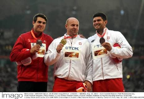 (150830) -- BEIJING, Aug. 30, 2015 -- Gold medalist Poland s Piotr Malachowski (C), silver medalist Belgium s Philip Milanov (L) and bronze medalist Poland s Robert Urbanek celebrate during the awarding ceremony of the men s discus throw event at the 2015 IAAF World Champships at the Bird s Nest National Stadium in Beijing, capital of China, Aug. 30, 2015. ) (SP)CHINA-BEIJING-IAAF WORLD CHAMPIONSHIPS-MEN S DISCUS THROW AWARDING CEREMONY (CN) WangxHaofei 