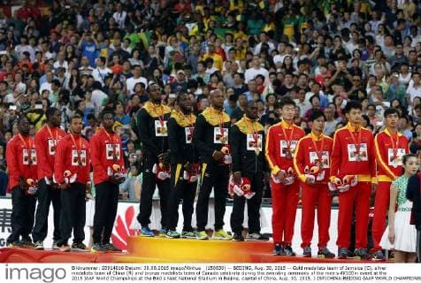 (150830) -- BEIJING, Aug. 30, 2015 -- Gold medalists team of Jamaica (C), silver medalists team of China (R) and bronze medalists team of Canada celebrate during the awarding ceremony of the men s 4X100m event at the 2015 IAAF World Champships at the Bird s Nest National Stadium in Beijing, capital of China, Aug. 30, 2015. ) (SP)CHINA-BEIJING-IAAF WORLD CHAMPIONSHIPS-MEN S 4X100M AWARDING CEREMONY (CN) WangxLili 
