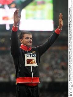 (150830) -- BEIJING, Aug. 30, 2015 -- Bronze medalist Germany s Rico Freimuth celebrates during the awarding ceremony of the men s decathlon event at the 2015 IAAF World Champships at the Bird s Nest National Stadium in Beijing, capital of China, Aug. 30, 2015. ) (SP)CHINA-BEIJING-IAAF WORLD CHAMPIONSHIPS-MEN S DECATHLON AWARDING CEREMONY (CN) WangxHaofei 