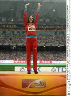 (150830) -- BEIJING, Aug. 30, 2015 -- Gold medalist Russia s Maria Kuchina celebrates during the awarding ceremony of the women s high jump event at the 2015 IAAF World Champships at the Bird s Nest National Stadium in Beijing, capital of China, Aug. 30, 2015. ) (SP)CHINA-BEIJING-IAAF WORLD CHAMPIONSHIPS-WOMEN S HIGH JUMP AWARDING CEREMONY (CN) WangxHaofei 