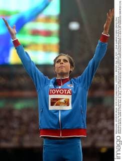 (150830) -- BEIJING, Aug. 30, 2015 -- Silver medalist Croatia s Blanka Vlasic celebrates during the awarding ceremony of the women s high jump event at the 2015 IAAF World Champships at the Bird s Nest National Stadium in Beijing, capital of China, Aug. 30, 2015. ) (SP)CHINA-BEIJING-IAAF WORLD CHAMPIONSHIPS-WOMEN S HIGH JUMP AWARDING CEREMONY (CN) WangxHaofei 