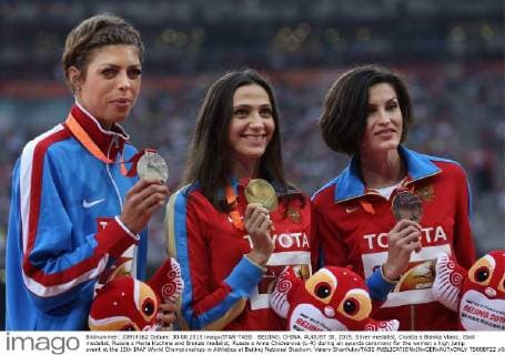 BEIJING, CHINA. AUGUST 30, 2015. Silver medalist, Croatia s Blanka Vlasic, Gold medalist, Russia s Maria Kuchina and Bronze medalist, Russia s Anna Chicherova (L-R) during an awards ceremony for the women s high jump event at the 15th IAAF World Championships in Athletics at Beijing National Stadium. Valery Sharifulin TASS  TS00BF22