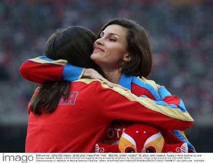 BEIJING, CHINA. AUGUST 30, 2015. Gold medalist, Russia s Maria Kuchina (L) and Bronze medalist, Russia s Anna Chicherova hugging during an awards ceremony for the women s high jump event at the 15th IAAF World Championships in Athletics at Beijing National Stadium. Valery Sharifulin TASS  TS00BF17