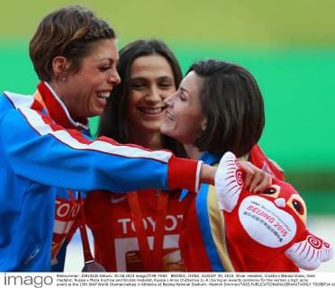 BEIJING, CHINA. AUGUST 30, 2015. Silver medalist, Croatia s Blanka Vlasic, Gold medalist, Russia s Maria Kuchina and Bronze medalist, Russia s Anna Chicherova (L-R) during an awards ceremony for the women s high jump event at the 15th IAAF World Championships in Athletics at Beijing National Stadium. Vladimir Smirnov TASS  TS00BF14