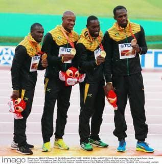 BEIJING, CHINA. AUGUST 30, 2015. Gold medalists, Jamaica s Nesta Carter, Asafa Powell, Nickel Ashmeade and Usain Bolt (L-R) during an awards ceremony for the men s 4x100m relay final at the 15th IAAF World Championships in Athletics at Beijing National Stadium. Vladimir Smirnov TASS  TS00BF31