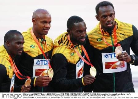BEIJING, CHINA. AUGUST 30, 2015. Gold medalists, Jamaica s Nesta Carter, Asafa Powell, Nickel Ashmeade and Usain Bolt (L-R) during an awards ceremony for the men s 4x100m relay final at the 15th IAAF World Championships in Athletics at Beijing National Stadium. Vladimir Smirnov TASS  TS00BF33