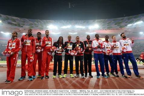 (150830) -- BEIJING, Aug. 30, 2015 -- Gold medalists team of the United States (C), silver medalists team of Trinidad and Tobago (L) and bronze medalists team of Britain pose during the awarding ceremony of the men s 4x400m relay event at the 2015 IAAF World Championships at the Bird s Nest National Stadium in Beijing, capital of China, Aug. 30, 2015. ) (SP)CHINA-BEIJING-IAAF WORLD CHAMPIONSHIPS-MEN S 4X400M RELAY AWARDING CEREMONY (CN) YuexYuewei 