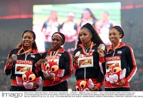 (150830) -- BEIJING, Aug. 30, 2015 -- Silver medalists team of the United States pose during the awarding ceremony of the women s 4x400m relay event at the 2015 IAAF World Championships at the Bird s Nest National Stadium in Beijing, capital of China, Aug. 30, 2015. ) (SP)CHINA-BEIJING-IAAF WORLD CHAMPIONSHIPS-WOMEN S 4X400M RELAY AWARDING CEREMONY (CN) YuexYuewei 
