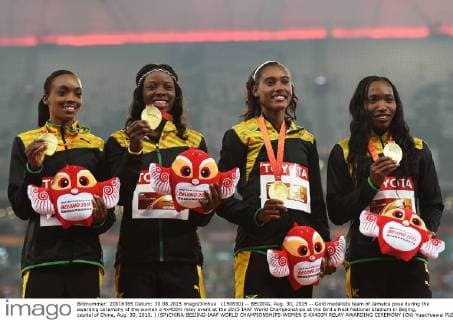 (150830) -- BEIJING, Aug. 30, 2015 -- Gold medalists team of Jamaica pose during the awarding ceremony of the women s 4x400m relay event at the 2015 IAAF World Championships at the Bird s Nest National Stadium in Beijing, capital of China, Aug. 30, 2015. ) (SP)CHINA-BEIJING-IAAF WORLD CHAMPIONSHIPS-WOMEN S 4X400M RELAY AWARDING CEREMONY (CN) YuexYuewei 
