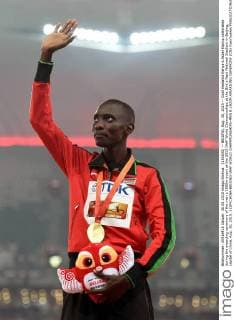 (150830) -- BEIJING, Aug. 30, 2015 -- Gold medalist Kenya s Asbel Kiprop celebrates during the awarding ceremony of the men s 1500m event at the 2015 IAAF World Championships at the Bird s Nest National Stadium in Beijing, capital of China, Aug. 30, 2015. ) (SP)CHINA-BEIJING-IAAF WORLD CHAMPIONSHIPS-MEN S 1500M AWARDING CEREMONY (CN) YuexYuewei 