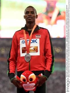 (150830) -- BEIJING, Aug. 30, 2015 -- Silver medalist Kenya s Elijah Motonei Manangoi poses during the awarding ceremony of the men s 1500m event at the 2015 IAAF World Championships at the Bird s Nest National Stadium in Beijing, capital of China, Aug. 30, 2015. ) (SP)CHINA-BEIJING-IAAF WORLD CHAMPIONSHIPS-MEN S 1500M AWARDING CEREMONY (CN) YuexYuewei 