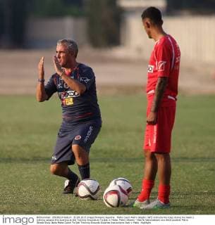 Malta coach Pietro Ghedin (left) instructs his rules during his team s training session this evening at the Training Grounds at Ta Qali in Malta. Pietro Ghedin - MALTA