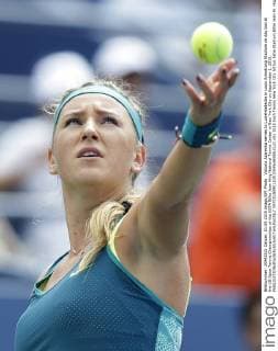 Victoria Azarenka serves to LucieHradecka in Louis Armstrong Stadium on day two at the US Open Tennis Championships at the USTA Billie Jean King National Tennis Center in New York City on September 1, 2015.  NYP20150901108 JOHNxANGELILLO