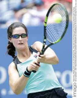 Jamie Loeb hits a backhand to Caroline Wozniacki of Denmark in their first round match in Arthur Ashe Stadium on day two at the US Open Tennis Championships at the USTA Billie Jean King National Tennis Center in New York City on September 1, 2015.  NYP20150901118 JOHNxANGELILLO