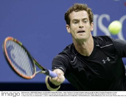 Andy Murray of United Kingdom returns a ball to Nick Kyrgios of Australia in their first round match in Arthur Ashe Stadium on day two at the US Open Tennis Championships at the USTA Billie Jean King National Tennis Center in New York City on September 1, 2015.  NYP20150901131 JOHNxANGELILLO