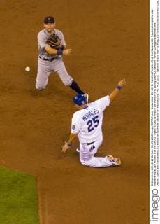 September 01, 2015: Kendrys Morales 25 of the Kansas City Royals attempts to play interference as Ian Kinsler 3 of the Detroit Tigers throws to first in the third inning during the MLB Baseball Herren USA game between the Detroit Tigers and the Kansas City Royals at Kauffman Stadium in Kansas City, MO. MLB 2015: Tigers vs Royals SEP 01 - ZUMAc04_