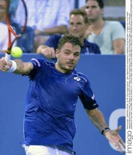 Stan Wawrinka of Switzerland competes during the men s singles first round match against Albert Ramos-Vinolas of Spain at the 2015 US Open Tennis Tournament in New York, the United States, Sept. 1, 2015. Wawrinka was qualified for the next round after beating Vinolas 3-0. ) (SP)US-NEW YORK-TENNIS-US OPEN-MEN S SINGLES-FIRST ROUND WangxLei 