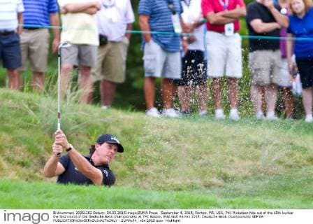 September 4, 2015; Norton, MA, USA; Phil Mickelson hits out of the 10th bunker the first round of the Deutsche Bank Championship at TPC Boston. PGA Golf Herren 2015: Deutsche Bank Championship SEP 04 - ZUMAc04_