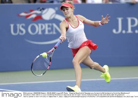 Eugenie Bouchard of Canada runs forward to hit forehand to Dominika Cibulkova of Slovakia in their match in Louis Armstrong Stadium on day five at the US Open Tennis Championships at the USTA Billie Jean King National Tennis Center in New York City on September 4, 2015.  NYP20150904104 JOHNxANGELILLO