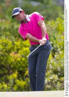 September 4, 2015; Norton, MA, USA; Rory McIlroy chips onto the green at the 8th hole during the first round of the Deutsche Bank Championship at TPC Boston. PGA Golf Herren 2015: Deutsche Bank Championship SEP 04 - ZUMAc04_