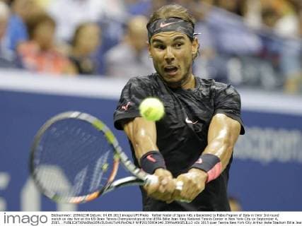 Rafael Nadal of Spain hits a backhand to Fabio Fognini of Italy in their 3rd round match on day five at the US Open Tennis Championships at the USTA Billie Jean King National Tennis Center in New York City on September 4, 2015. .  NYP20150904140 JOHNxANGELILLO