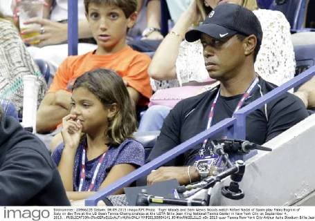 Tiger Woods and Sam Alexis Woods watch Rafael Nadal of Spain play Fabio Fognini of Italy on day five at the US Open Tennis Championships at the USTA Billie Jean King National Tennis Center in New York City on September 4, 2015. .  NYP20150904141 JOHNxANGELILLO