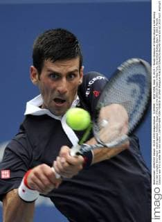 (150905) -- NEW YORK, Sept. 4, 2015 -- Novak Djokovic of Serbia returns a ball during the men s singles third round match against Andreas Seppi of Italy at the 2015 US Open in New York, the United States, Sept. 4, 2015. Novak Djokovic won 3-0 to enter the next round. ) (SP)US-NEW YORK-TENNIS-US OPEN WangxLei 