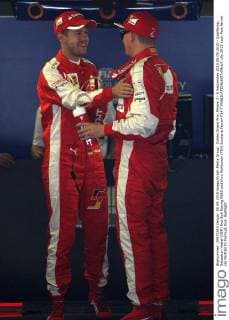 Italian Grand Prix, Monza 3 - 6 September 2015 05.09.2015 - Qualifying, Sebastian Vettel (GER) Red Bull Racing RB10 and Kimi Raikkonen (FIN) Scuderia Ferrari F14-T 