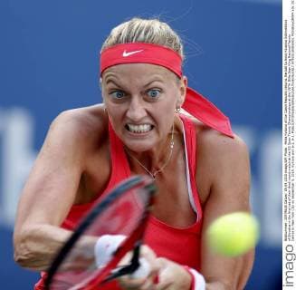 Petra Kvitova of the Czech Republic returns the ball to Anna Karolina Schmiedlova of Slovakia in the first set of their third round match at the US Open Tennis Championships at the USTA Billie Jean King National Tennis Center in New York City on September 5, 2015. Kvitova won 6-2, 6-1.  NYP20150905302 MONIKAxGRAFF