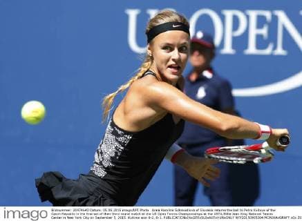 Anna Karolina Schmiedlova of Slovakia returns the ball to Petra Kvitova of the Czech Republic in the first set of their third round match at the US Open Tennis Championships at the USTA Billie Jean King National Tennis Center in New York City on September 5, 2015. Kvitova won 6-2, 6-1.  NYP20150905304 MONIKAxGRAFF