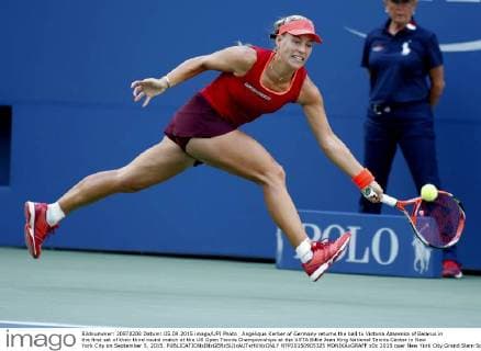Angelique Kerber of Germany returns the ball to Victoria Azarenka of Belarus in the first set of their third round match at the US Open Tennis Championships at the USTA Billie Jean King National Tennis Center in New York City on September 5, 2015.  NYP20150905325 MONIKAxGRAFF