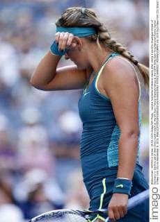 Victoria Azarenka of Belarus reacts after losing a point to Angelique Kerber of Germany in the first set of their third round match at the US Open Tennis Championships at the USTA Billie Jean King National Tennis Center in New York City on September 5, 2015.  NYP20150905327 MONIKAxGRAFF