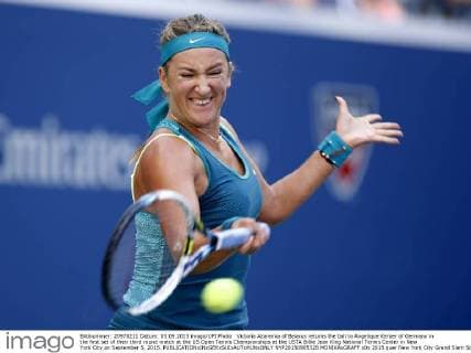 Victoria Azarenka of Belarus returns the ball to Angelique Kerber of Germany in the first set of their third round match at the US Open Tennis Championships at the USTA Billie Jean King National Tennis Center in New York City on September 5, 2015.  NYP20150905328 MONIKAxGRAFF