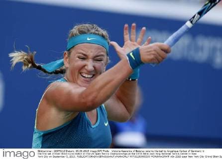 Victoria Azarenka of Belarus returns the ball to Angelique Kerber of Germany in the first set of their third round match at the US Open Tennis Championships at the USTA Billie Jean King National Tennis Center in New York City on September 5, 2015.  NYP20150905330 MONIKAxGRAFF