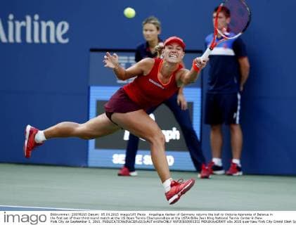 Angelique Kerber of Germany returns the ball to Victoria Azarenka of Belarus in the first set of their third round match at the US Open Tennis Championships at the USTA Billie Jean King National Tennis Center in New York City on September 5, 2015.  NYP20150905332 MONIKAxGRAFF