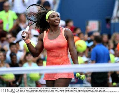Serena Williams of the USA gets ready to hit balls into the stands for the fans after defeating Madison Keys (USA) during their fourth round match at the US Open Tennis Championships at the USTA Billie Jean King National Tennis Center in New York City on September 6, 2015. .  NYP20150906345 MONIKAxGRAFF