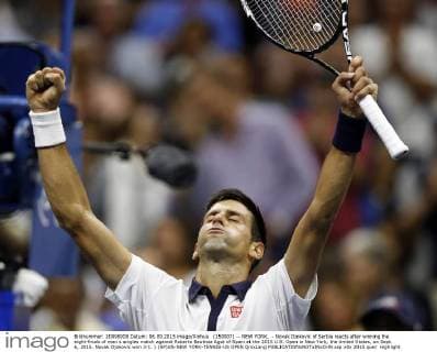 (150907) -- NEW YORK, - Novak Djokovic of Serbia reacts after winning the eight-finals of men s singles match against Roberto Bautista Agut of Spain at the 2015 U.S. Open in New York, the United States, on Sept. 6, 2015. Novak Djokovic won 3-1. ) (SP)US-NEW YORK-TENNIS-US OPEN QinxLang 