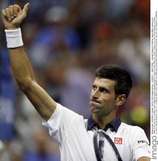 (150907) -- NEW YORK, - Novak Djokovic of Serbia reacts after winning the eight-finals of men s singles match against Roberto Bautista Agut of Spain at the 2015 U.S. Open in New York, the United States, on Sept. 6, 2015. Novak Djokovic won 3-1. ) (SP)US-NEW YORK-TENNIS-US OPEN QinxLang 