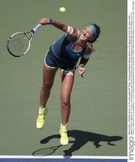 Victoria Azarenka of Belarus serves in the second set of her 4th round match against Varvara Lepchenko in Arthur Ashe Stadium on day 8 at the US Open Tennis Championships at the USTA Billie Jean King National Tennis Center in New York City on September 7, 2015.  NYP20150907104 JOHNxANGELILLO