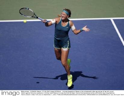 Victoria Azarenka of Belarus hits a forehand in the second set of her 4th round match against Varvara Lepchenko in Arthur Ashe Stadium on day 8 at the US Open Tennis Championships at the USTA Billie Jean King National Tennis Center in New York City on September 7, 2015.  NYP20150907105 JOHNxANGELILLO