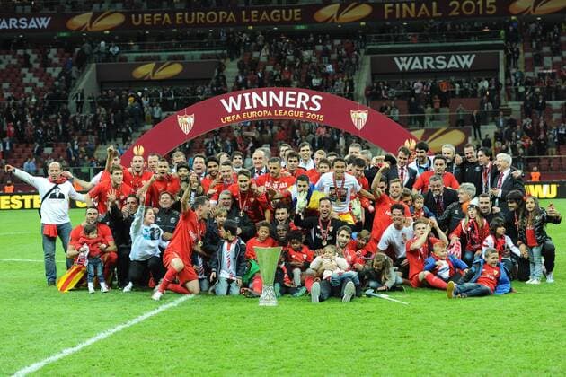 May 27, 2015 - Naples, Italy - Sevilla players celebrate with the trophy at the end of the UEFA Europa league final football match between FC Dnipro Dnipropetrovsk and Sevilla FC on May 27,2015 at Stadion Narodowy in Warsaw, Poland. FC Dnipro Dnipropetrovsk v Sevilla FC - UEFA Europa League Final  - ZUMAn230