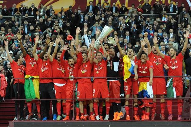 May 27, 2015 - Naples, Italy - Sevilla players celebrate with the trophy at the end of the UEFA Europa league final football match between FC Dnipro Dnipropetrovsk and Sevilla FC on May 27,2015 at Stadion Narodowy in Warsaw, Poland. FC Dnipro Dnipropetrovsk v Sevilla FC - UEFA Europa League Final  - ZUMAn230
